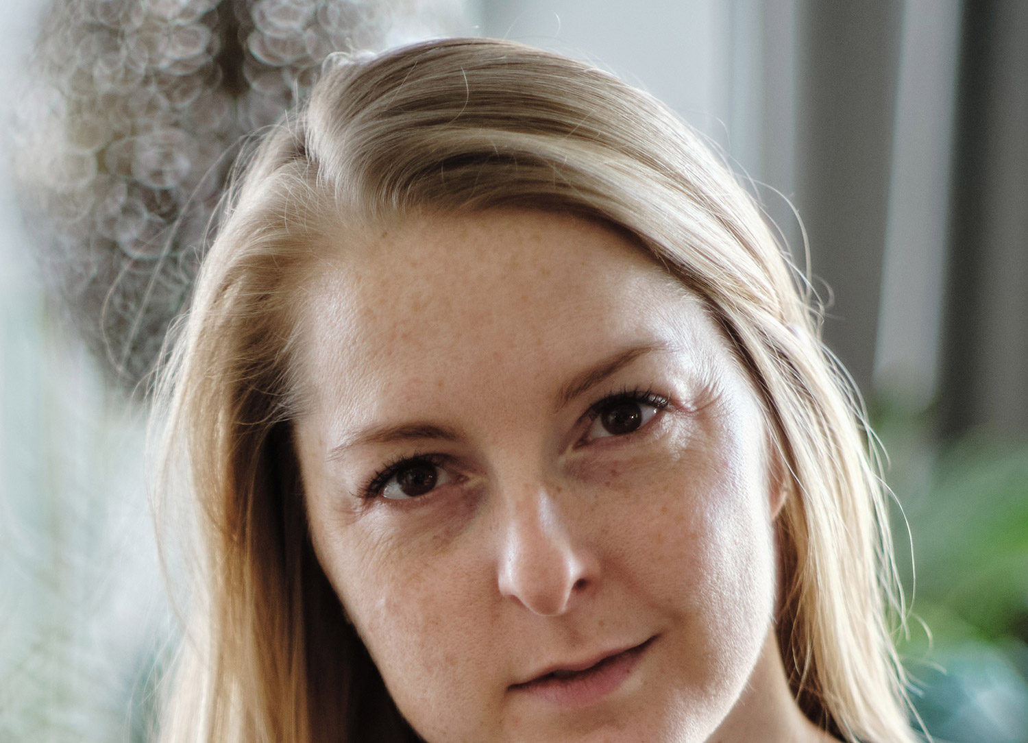 Foto zeigt einen Ausschnitt eines Fotos, Gesicht einer Frau